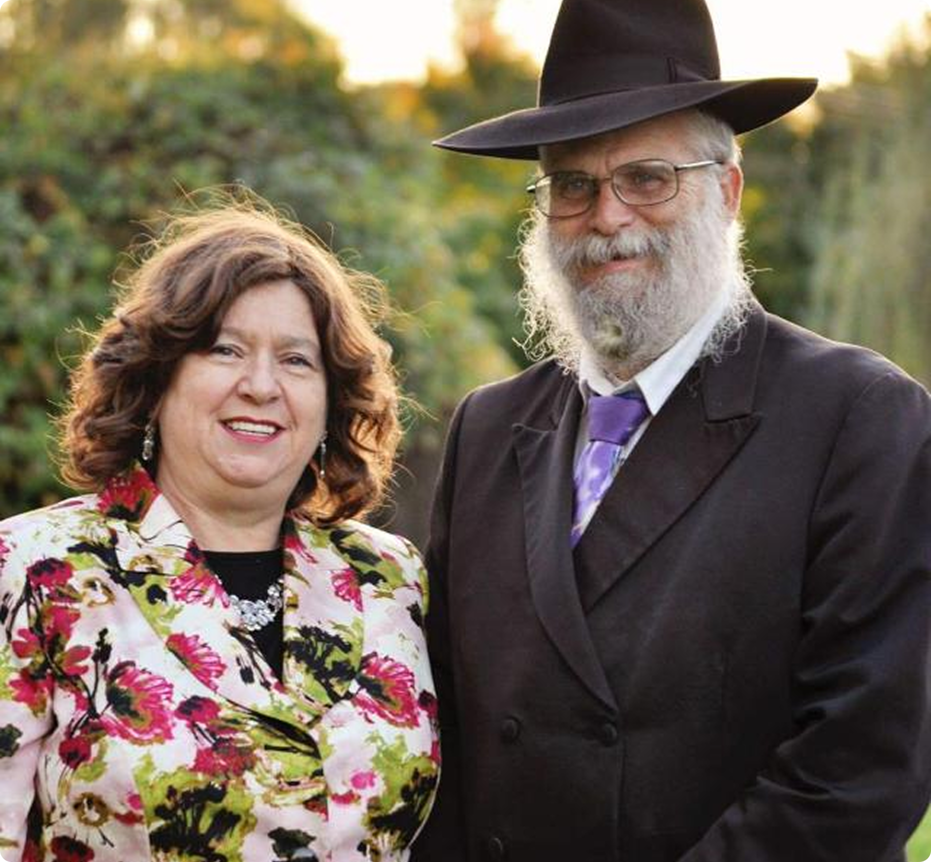 Rabbi Elimelech and Rebbetzin Chaya Sara Silberberg standing together